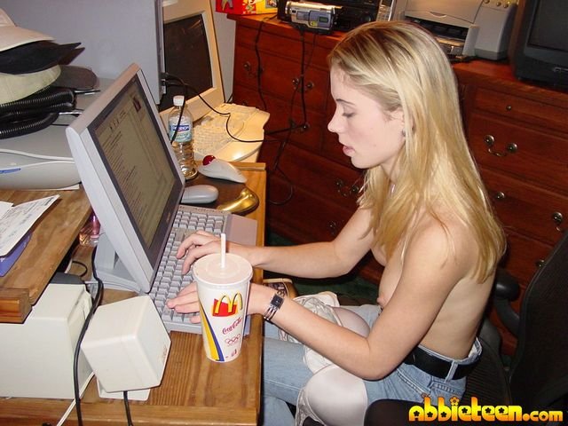 Abbie Surfing Yahoo and CamWhores While Topless