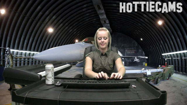 Jenna Suvari was assigned desk jockey duty during her tenure in the Air Force. What's a girl to do in a lonely hanger with only a military mannequin near her?